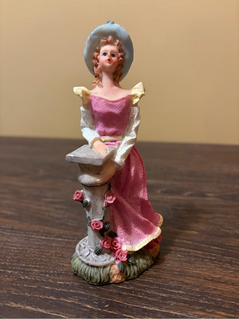 Victorian-Style Pink Lady Figurine with Blue Hat